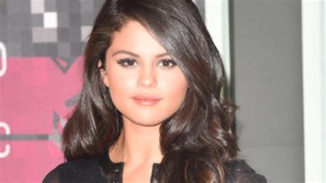 Selena Gomez poses naked on the cover of new album, Revival